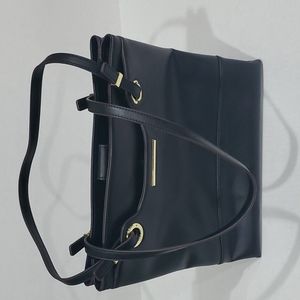 LIKE NEW Anne Klein Black purse with polka dot lining